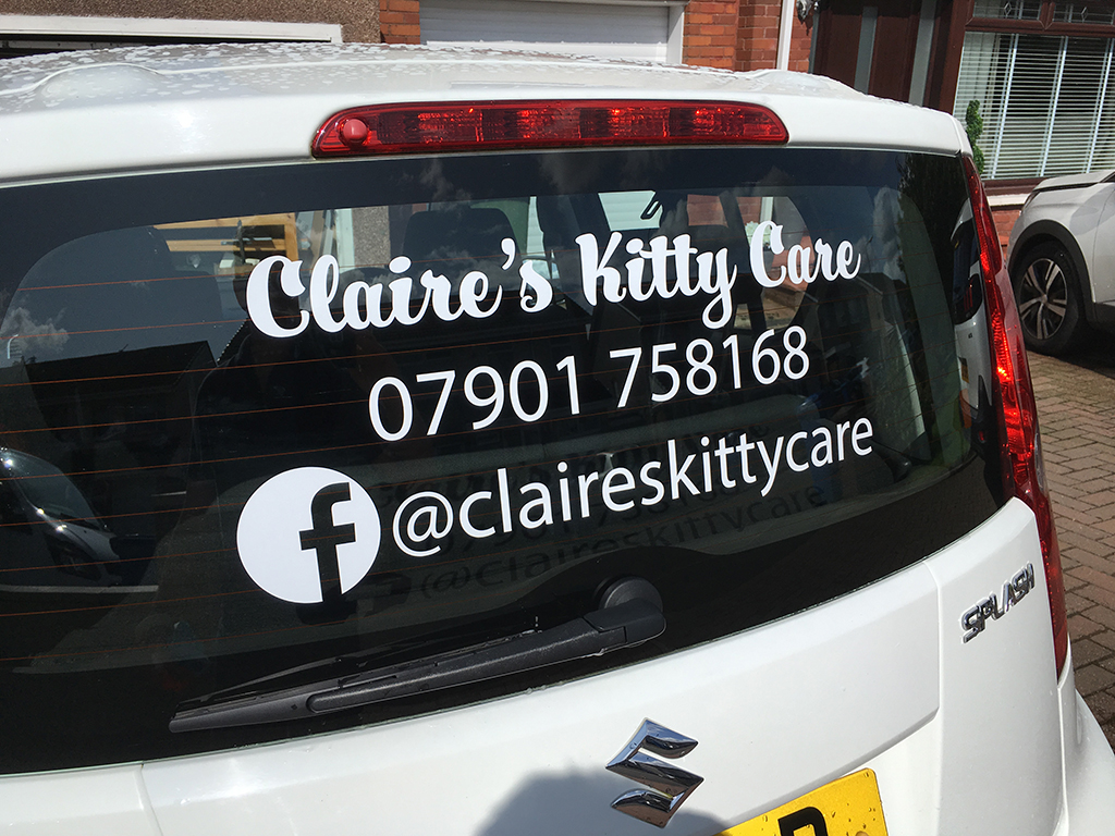 white vinyl window graphic on back car of window for claires kitty services glasgow scotland telephone: 07901758168